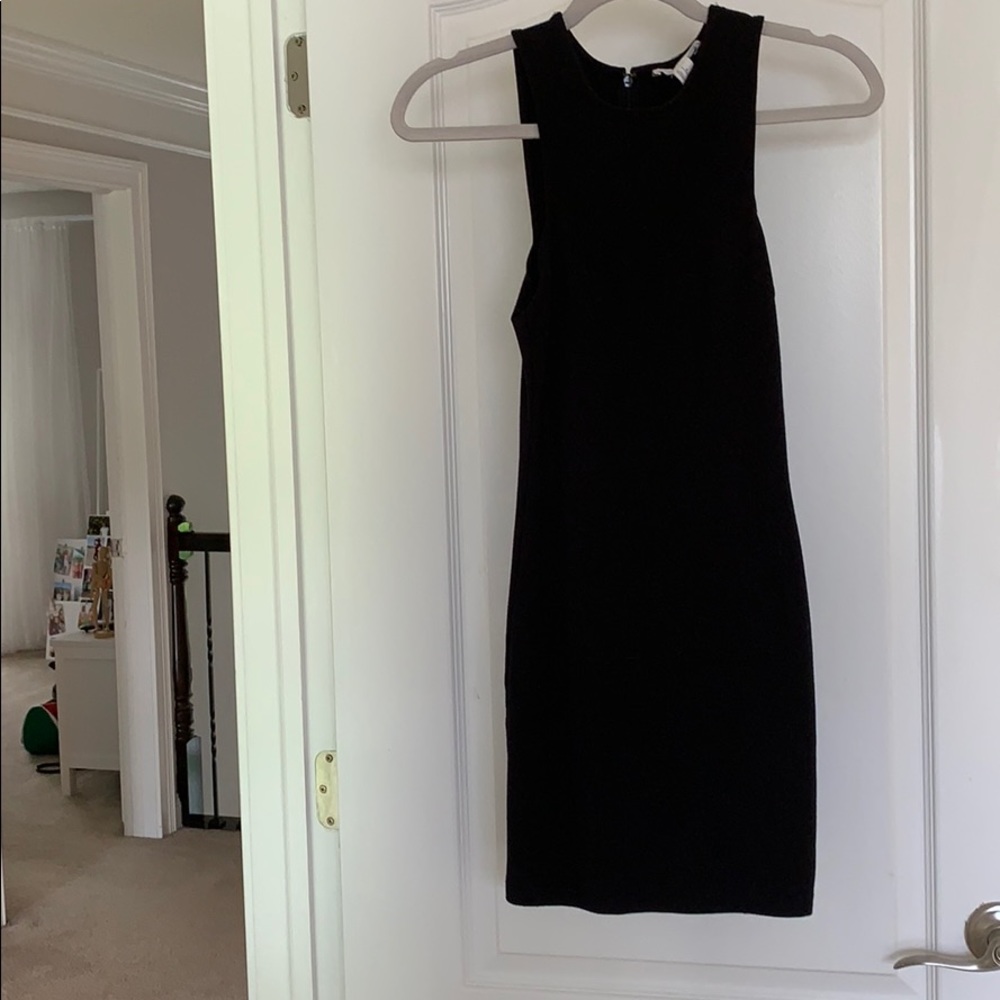 Sleek, black form fitting dress